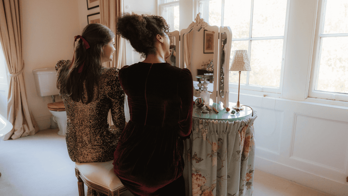 Models at dressing table
