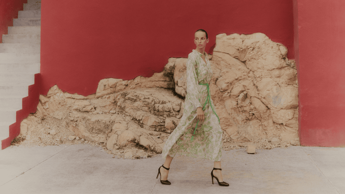 Woman walking in printed dress